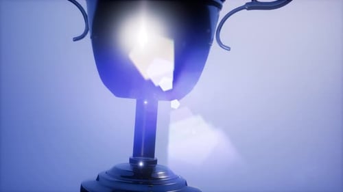 Shining Metallic Award Trophy Rotating with Lens Flares