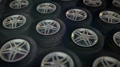 Dynamic 3D Render of Automotive Tires and Metallic Rims