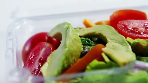 Fresh vegetables in plastic container