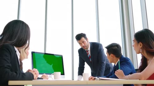 Business People in the Conference Room with Green Screen