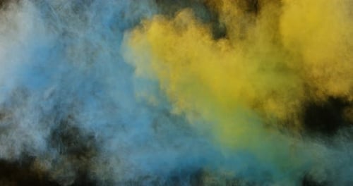 Close-up of color powder splashing