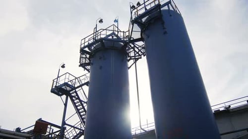 Bottom View Large Round Towers Against Cloudy Sky