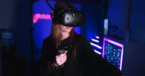 Young Woman Playing Virtual Reality Games