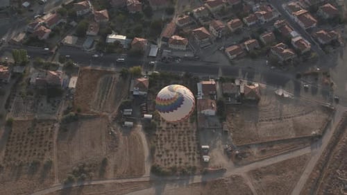 Hot Air Balloon Above the Village