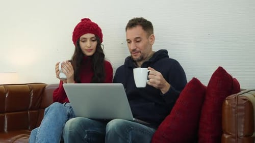 Couple Work Together From Home With Coffee
