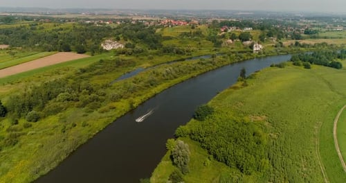 Aerial View of Motorboat Swimming in River