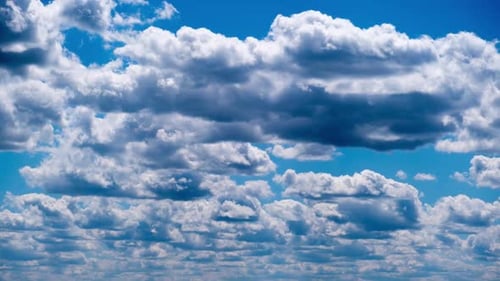 Timelapse of Layered Cumulus Clouds Moving in the Blue Sky