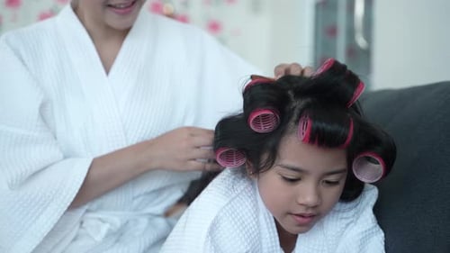 Child Getting Her Hair Combed Indoors