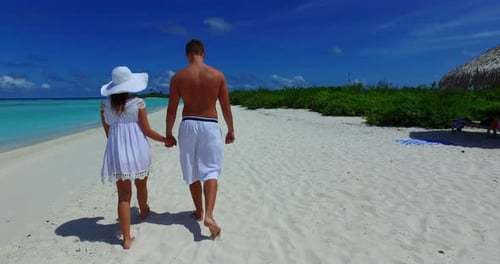 Romantic man and woman married on vacation spend quality time on beach on paradise white sand backgr