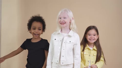 Happy Smiling Kids Isolated in Studio