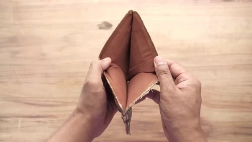 Man Hand Open an Empty Wallet with Copy Space