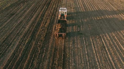 Tractor Plowing A Farm Field 2