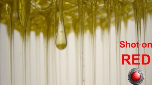 Syrup Is Flowing Down Melting Drops In Slow Motion
