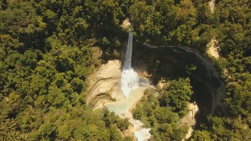 Tropical Waterfall Aerial View Surrounded by Lush Forest