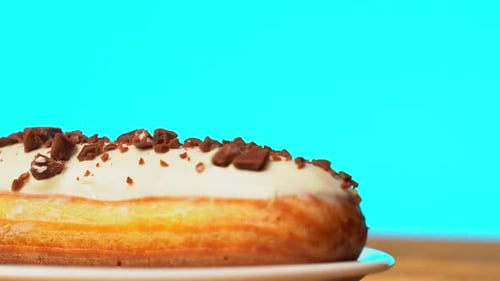 Pastry Rotating with Chocolate Sauce Poured on Top