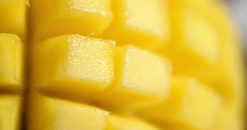 Cut Into Cubes of Ripe Mango Slowly Rotates.