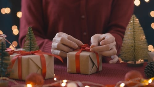 Making Bow Ribbon On Christmas Gift