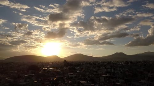 Cloudy aerial shot in sunset, Mexico city
