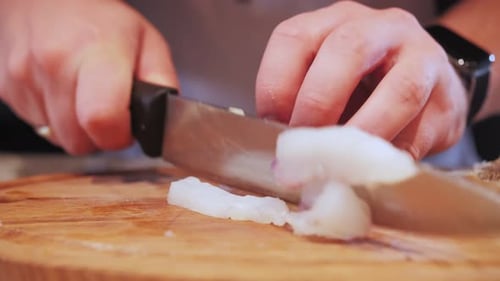 Fish Fillet Cut on Wooden Cutting Board
