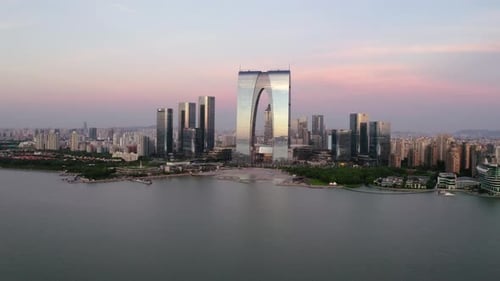 CBD buildings by the lake. Aerial in Suzhou, China