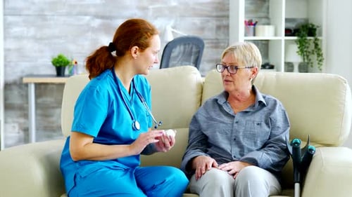 Female Doctor Consultin a Senior Woman About Pills Dosage and Subscription