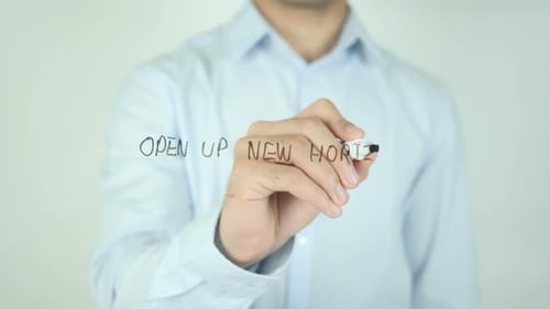 Writing 'Open Up New Horizons' on Glass