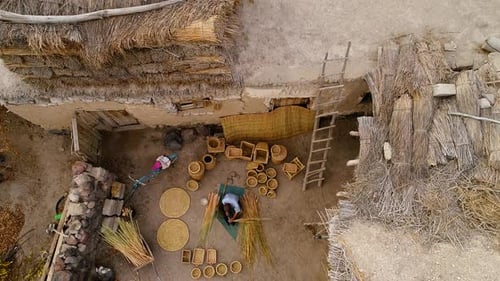 Man Weaving Bamboo Basket