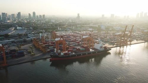Aerial top view of container cargo ship in the export and import business and logistics