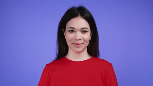 Smiling Woman in Red Shirt Close Up Portrait