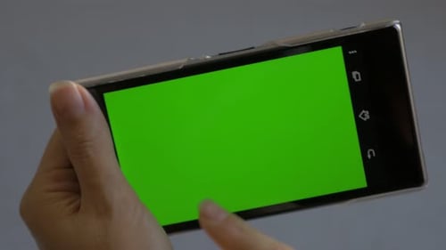Mobile phone green screen background 4K UHD 2160p footage - Smart phone using green screen 4K 3840X