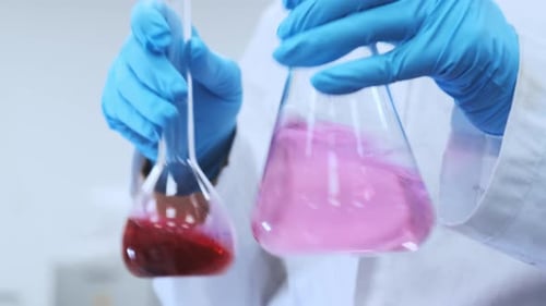 Medical Research Scientist Prepares Solutions in Applied Science Laboratory