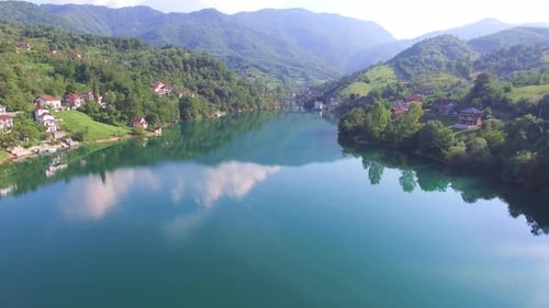 Flying over clear river in Bosnia