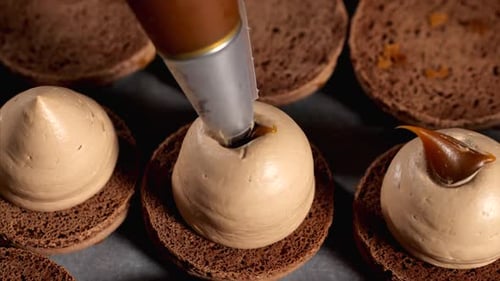 Chef Is Making Caramel Macarons, Close-up.