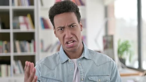 Young Adult Reacting to a Bad Smell