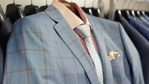 Men's Suits Displayed in a Clothing Store