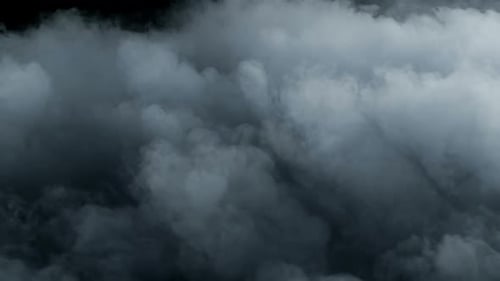 Moving Abstract Clouds of Smoke on Black Background
