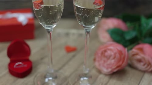Romantic Engagement with Roses and Champagne