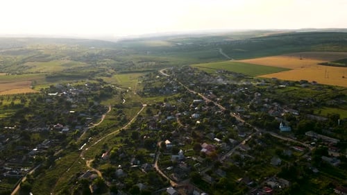 Fly Over Small Village Time Lapse