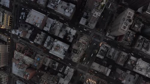 Birds Perspective Flight Over Manhattan New York City Busy Street Lights at Epic Dusk