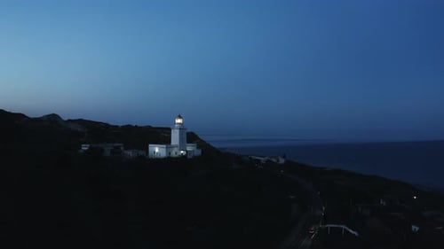 Lighthouse By Night