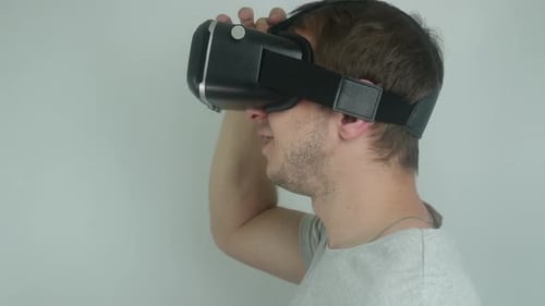 Man Using Virtual Reality Headset Indoors