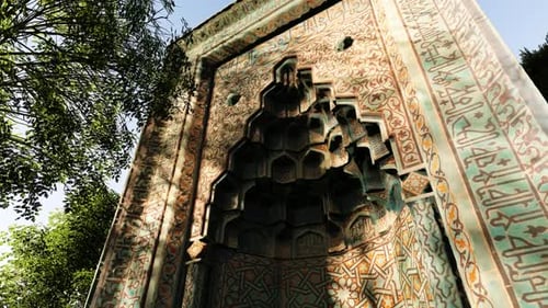 Ornate Islamic Architecture with Geometric Patterns and Calligraphy