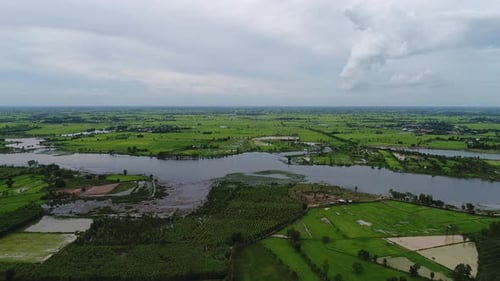 Aerial view from drone fly over river and agriculture area