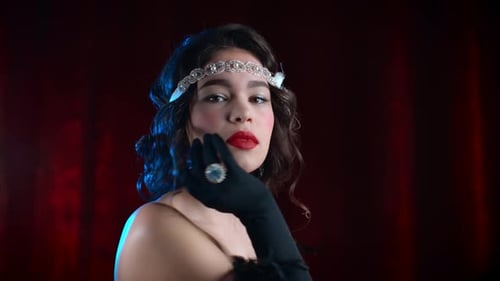 Portrait of Brunette Woman Dressed in Style of Great Gatsby Flirting Posing