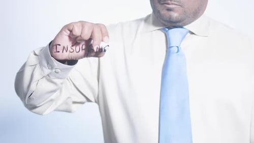 Man Writes "Insurance" on Clear Surface