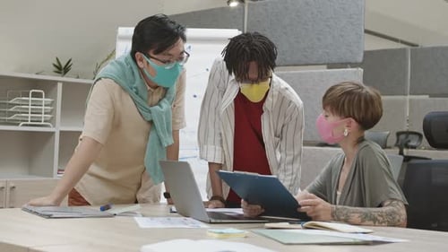 Multiethnic Young People on Business Meeting in Office