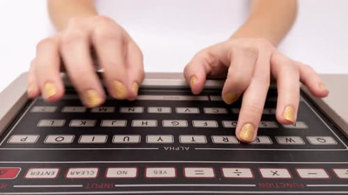 Hands Typing on Computer Keyboard