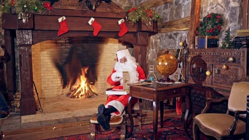 Santa Claus Relaxing by the Fireplace