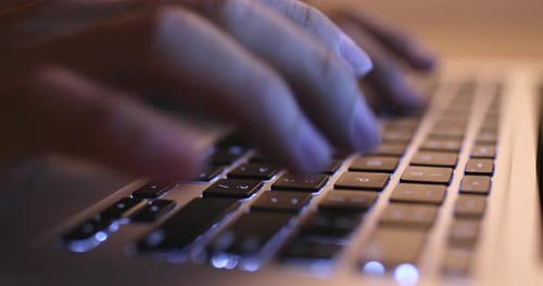 Typing on Laptop Computer