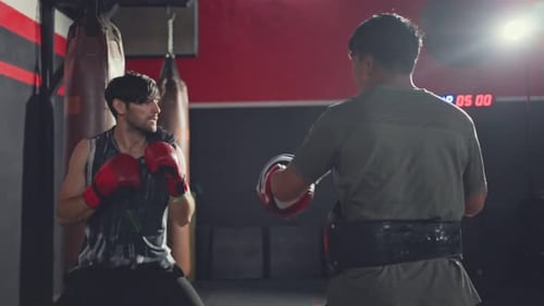 Men Boxing Training in Gym